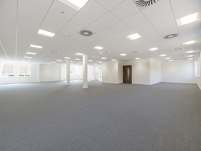Spacious open plan office space to let, refurbished with carpeting throughout and plenty of natural light