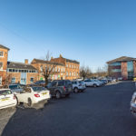 External and car park shot of Unit 10 Empire Court - offices to let Redditch