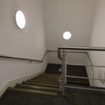 Stairwell at 2426 Regents Court, first floor offices accessed via dedicated ground floor entrance