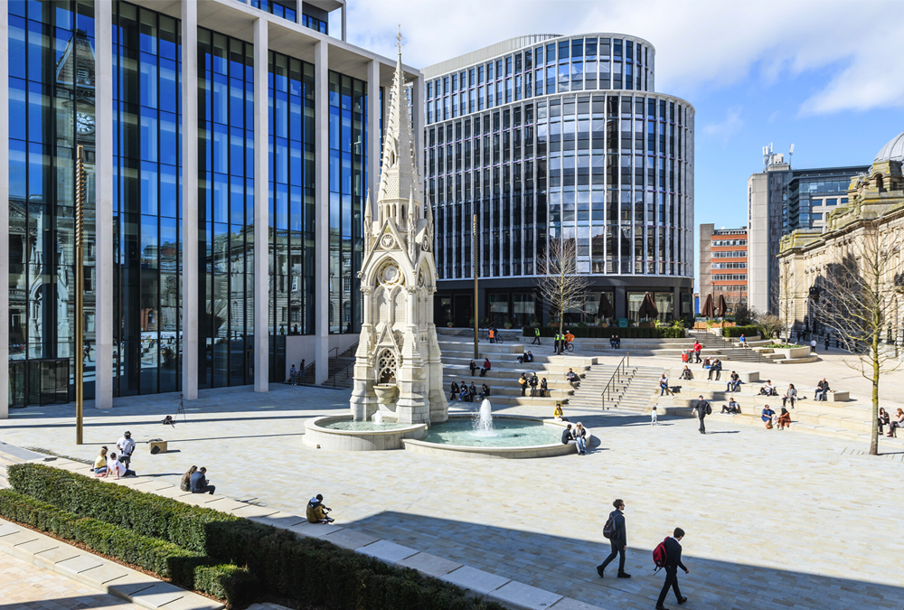 Chamberlain Square, Paradise, Birmingham in natural daylight. People walking around and enjoying Birmingham city centre offices