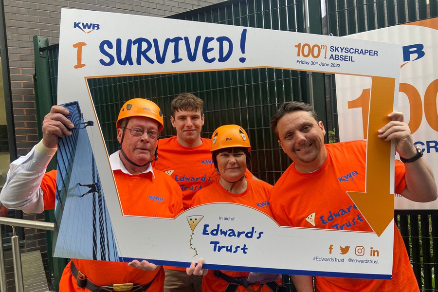 Some of the KWB abseil 2023 team getting ready to descend the 100-metre Bank Tower 2.