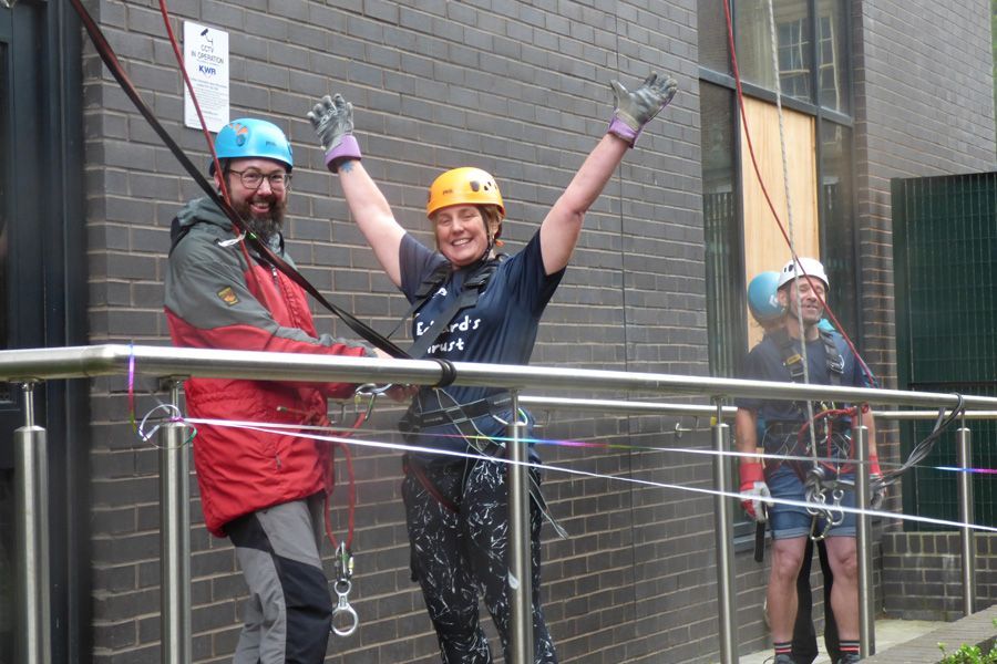 Supporters taking part in the KWB abseil 2023, raising money for the Edward's Trust charity.