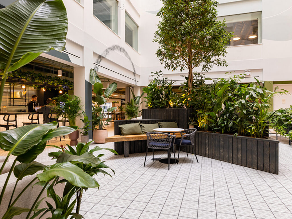 The largest letting in Q3's Birmingham office market - Foundry's impressive atrium filled with natural light and plants, providing a breakout area for collaborating