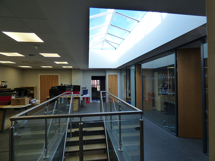 Stuart Court upper floor view with stair case and individual office rooms