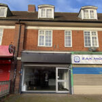 426 Birmingham Road retail shop to rent Sutton Coldfield showing full height glass window and roller shutters